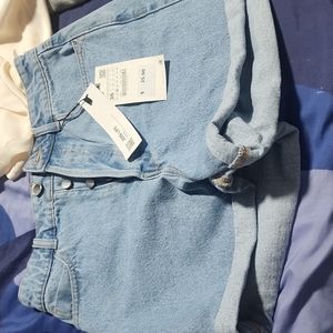Brand new  womans high rise button fly size 4 denim shorts